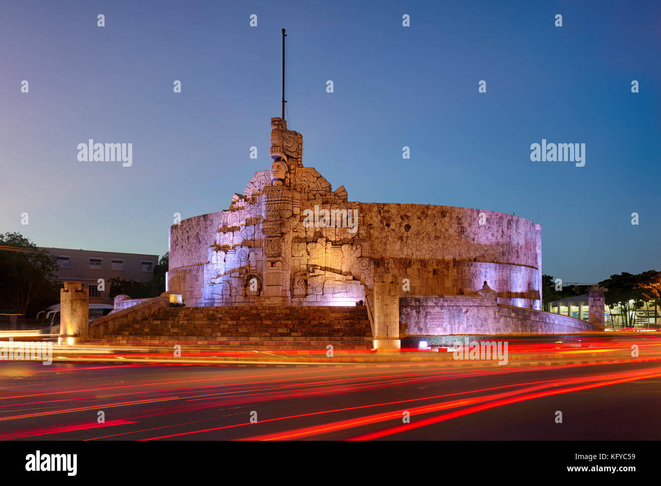 Night shot of the Monument to Motherland, Monumento a La Patria in spanish, with car light trails, in Merida, Yucatan, Mexico Stock Photo