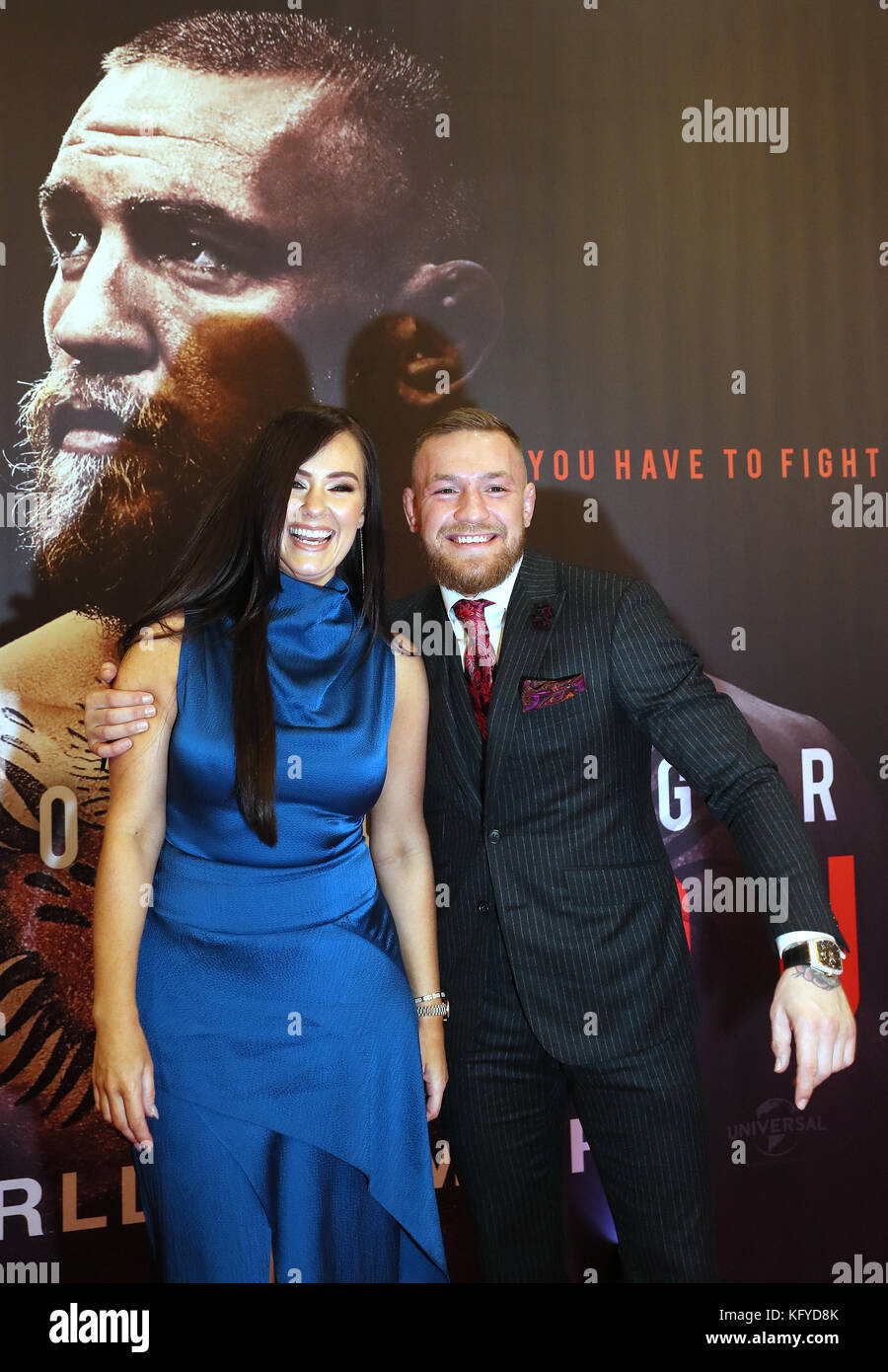 Conor McGregor with his partner Dee Devlin on arrival at the Conor McGregor: Notorious premiere at the Savoy Cinema in Dublin. Stock Photo