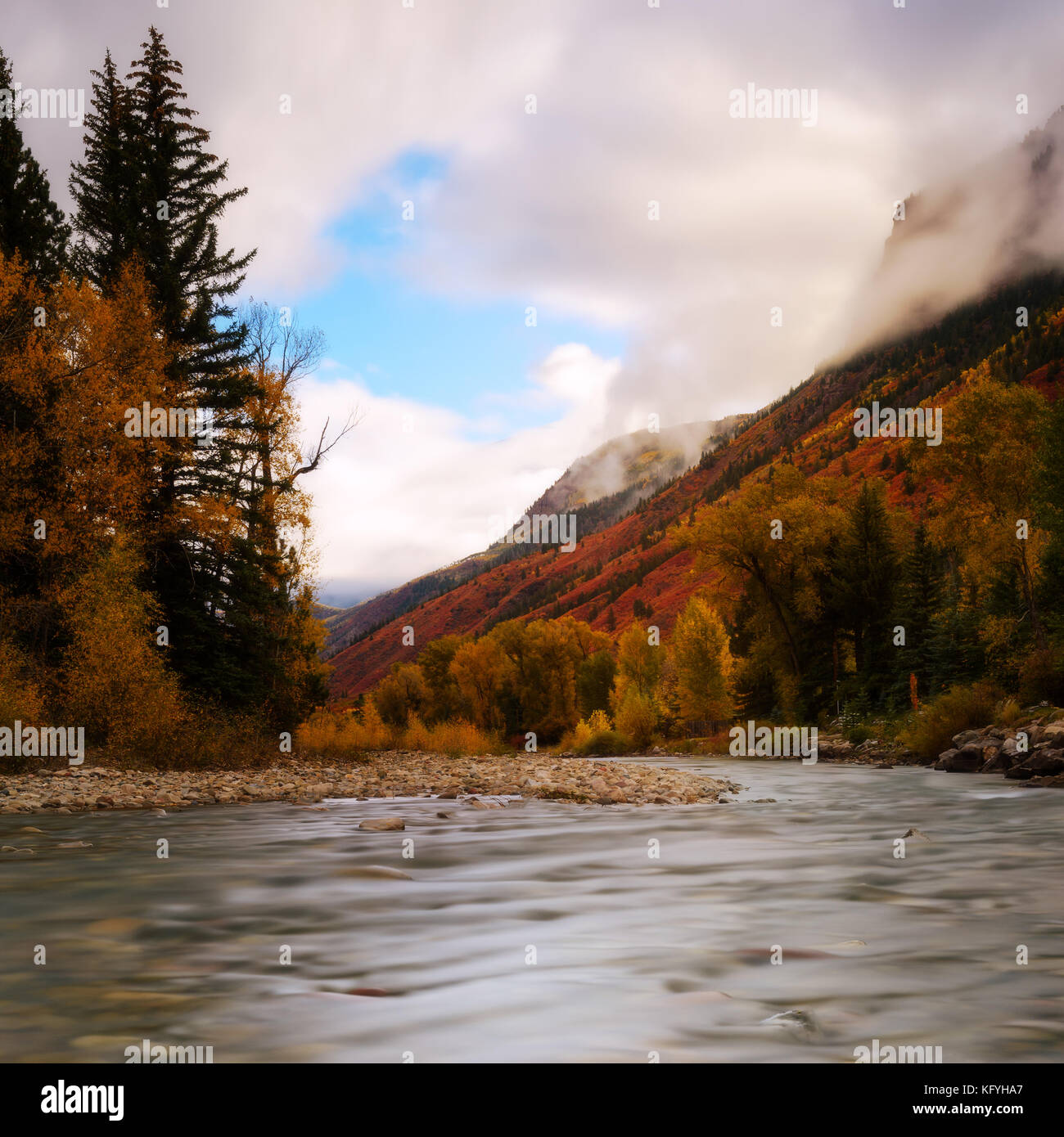Cloudy day at small creek in Colorado during Fall, Autumn, Season. Winter season Stock Photo