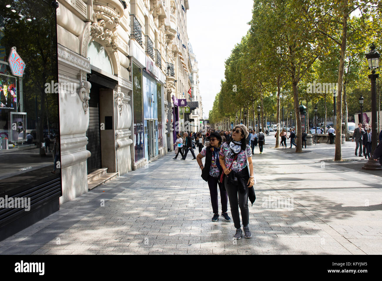 French people and foreigner travlers walking visit and shopping at sidewalk in L’avenue des Champs-Elysees on September 6, 2017 in Paris, France Stock Photo
