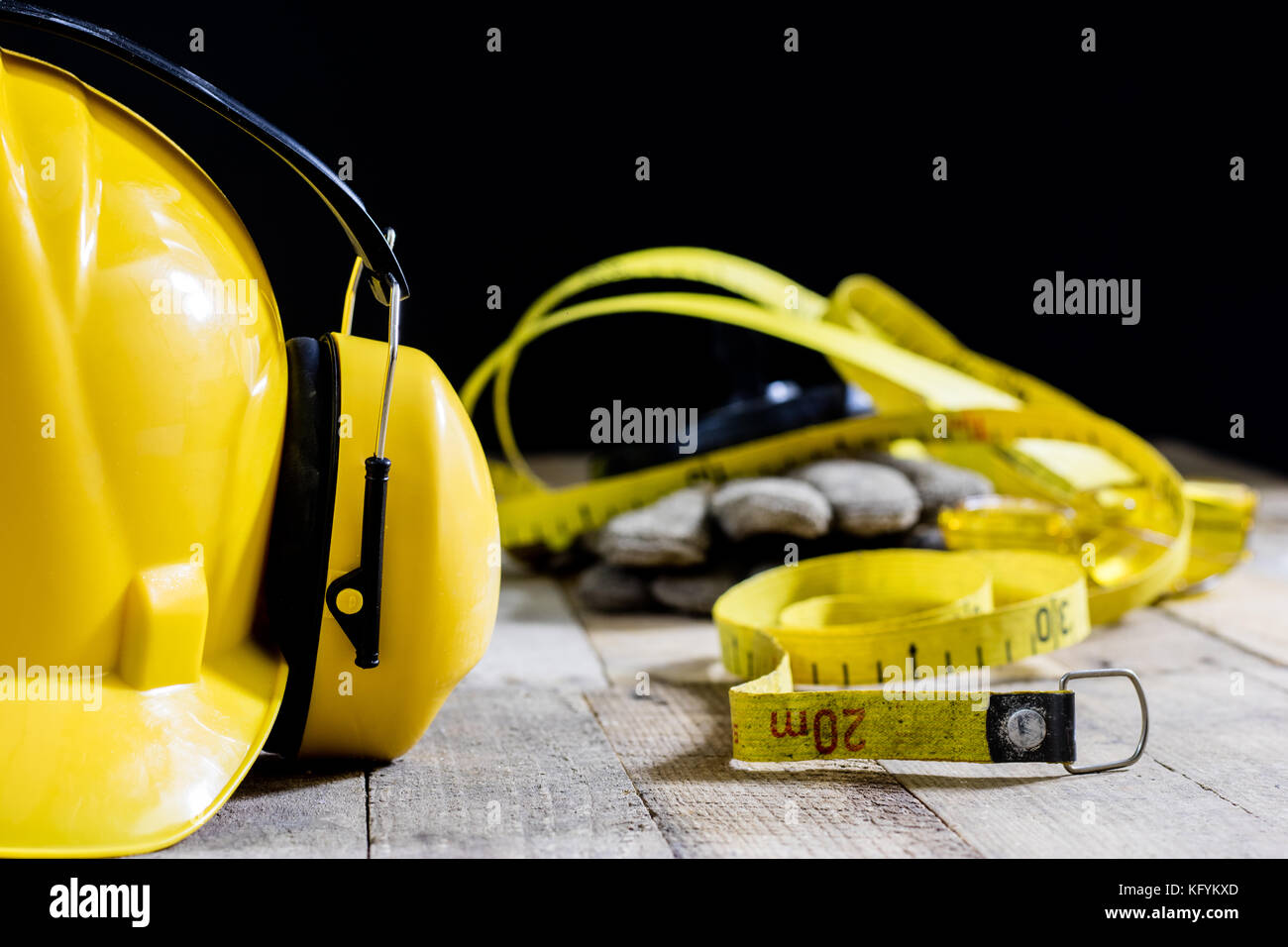 helmet, hearing protection, tools, table. Safety equipment and tools Stock Photo Alamy