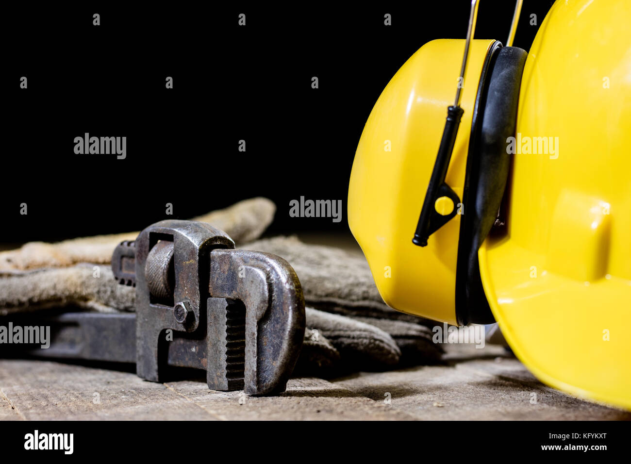 helmet, hearing protection, tools, table. Safety equipment and tools Stock Photo Alamy