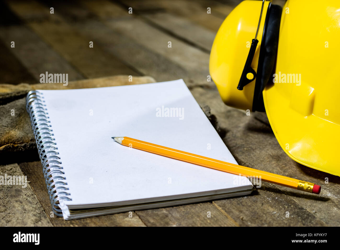helmet, hearing protection, tools, table. Safety equipment and tools Stock Photo Alamy