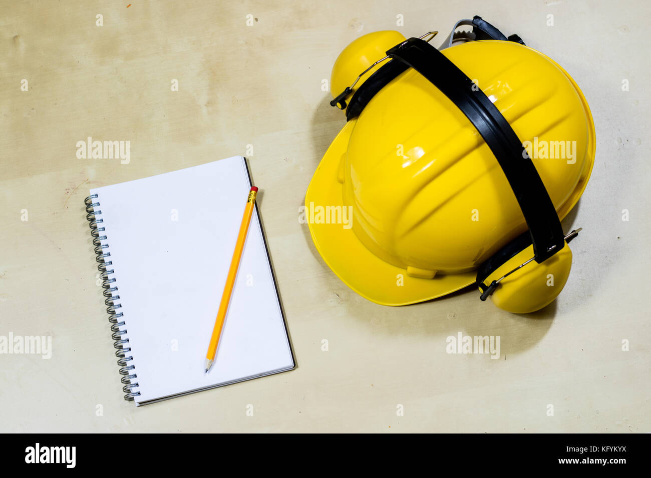 helmet, hearing protection, tools, table. Safety equipment and tools Stock Photo Alamy
