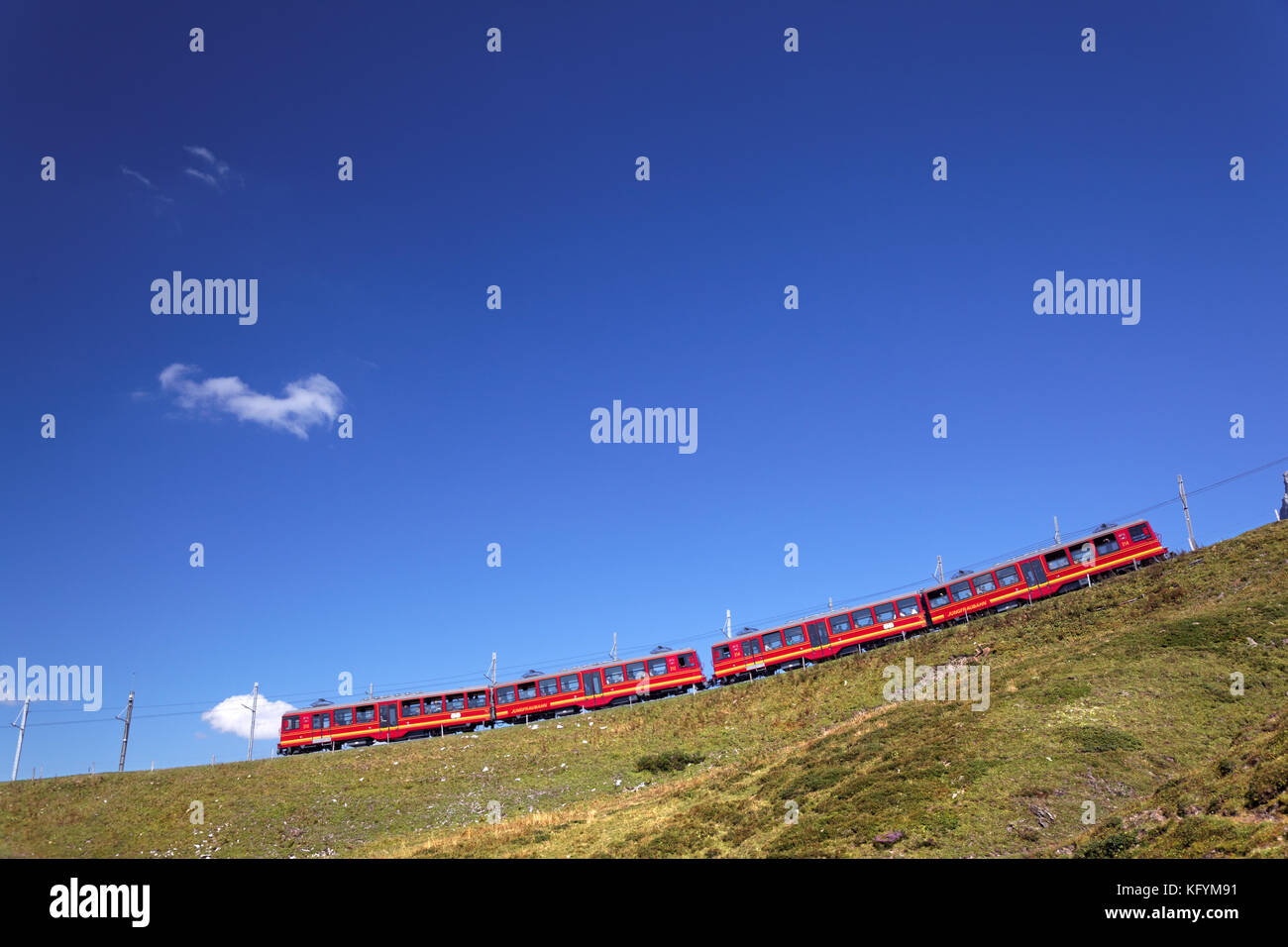 Red rail cars on the Jungfrau railway, Bernese Oberland, Switzerland