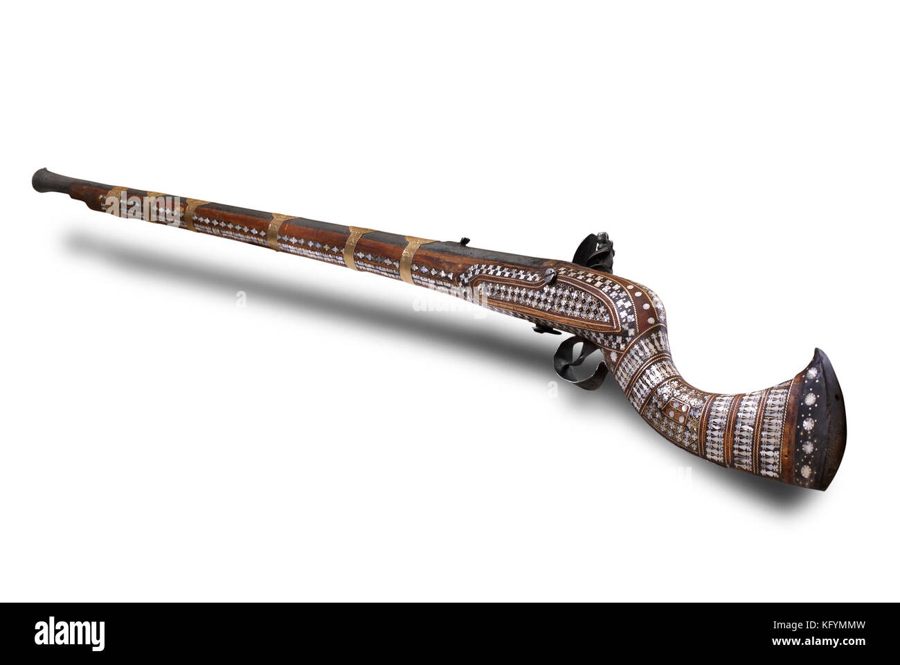Afghan cap rifle with beautiful nacre decoration. The 19th century. Path on the white background. Stock Photo