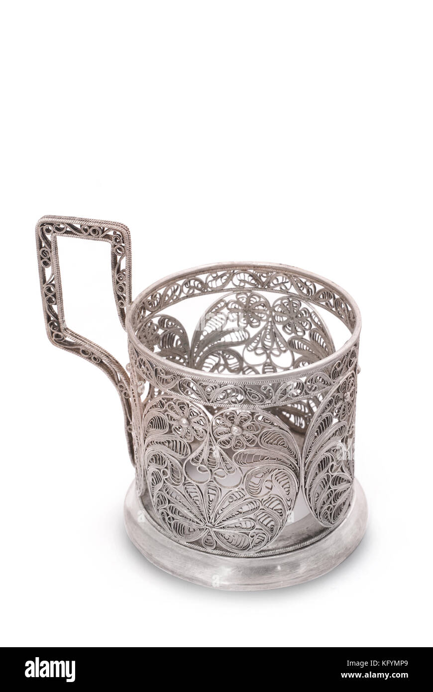 Vintage silver glass holder. Very useful and very popular thing in old Russia and USSR thing for holding hot tea glass (especially during travel in tr Stock Photo