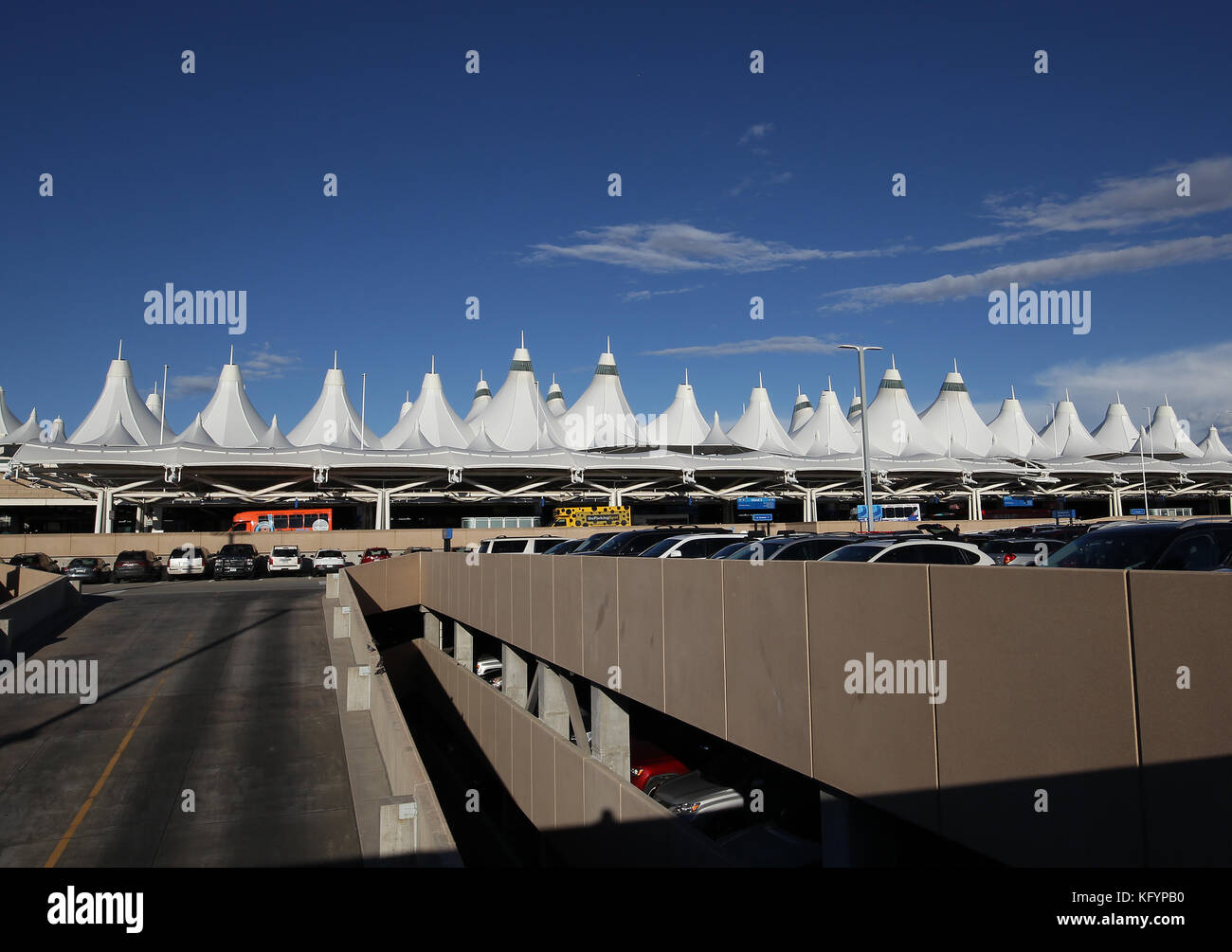 The Teflon-coated fiberglass roof of Denver International Airport resembles the Rocky Mountains. Stock Photo