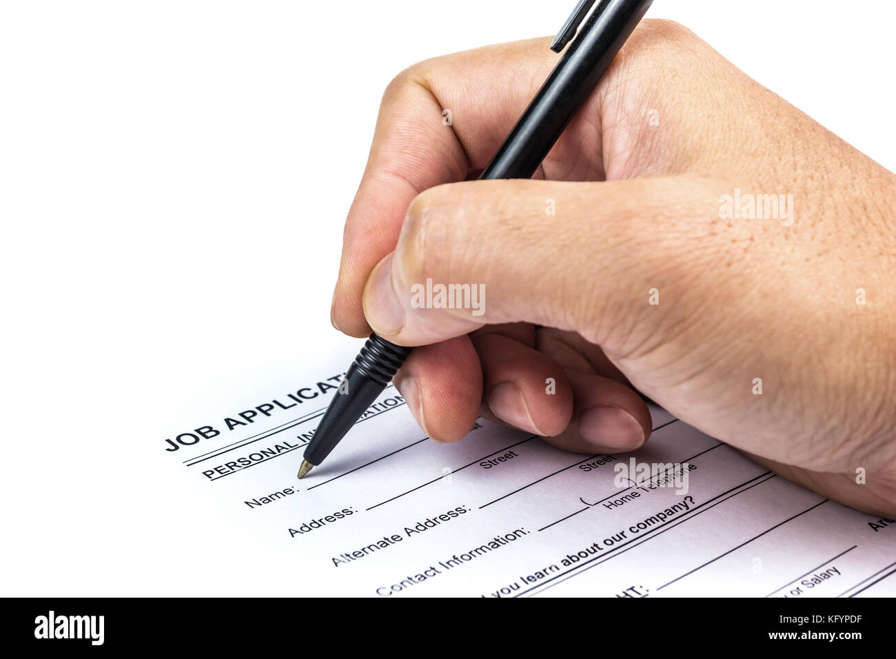 A photo of Job application with pen and hand on isolate white ...