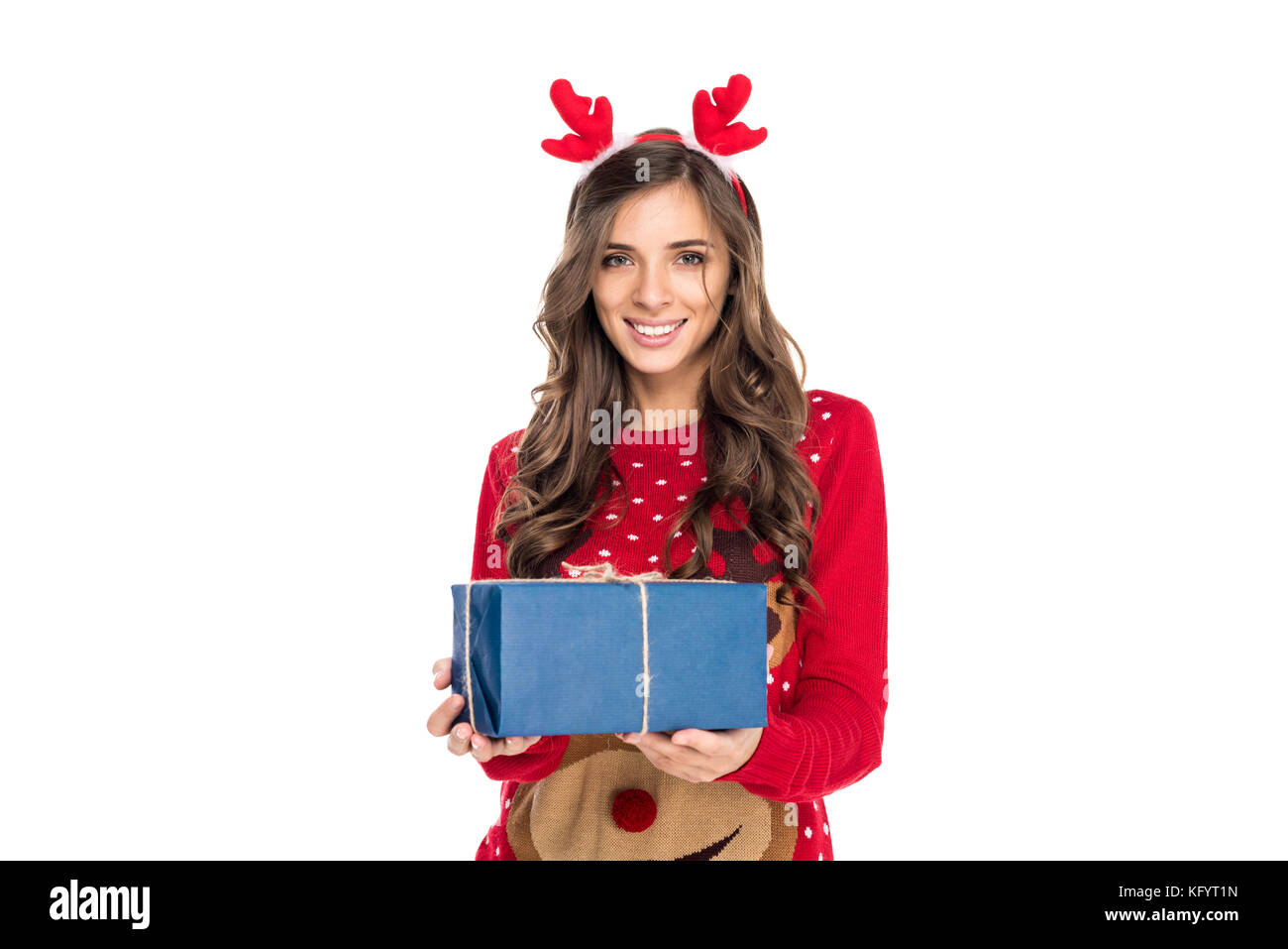 woman holding christmas gift Stock Photo - Alamy