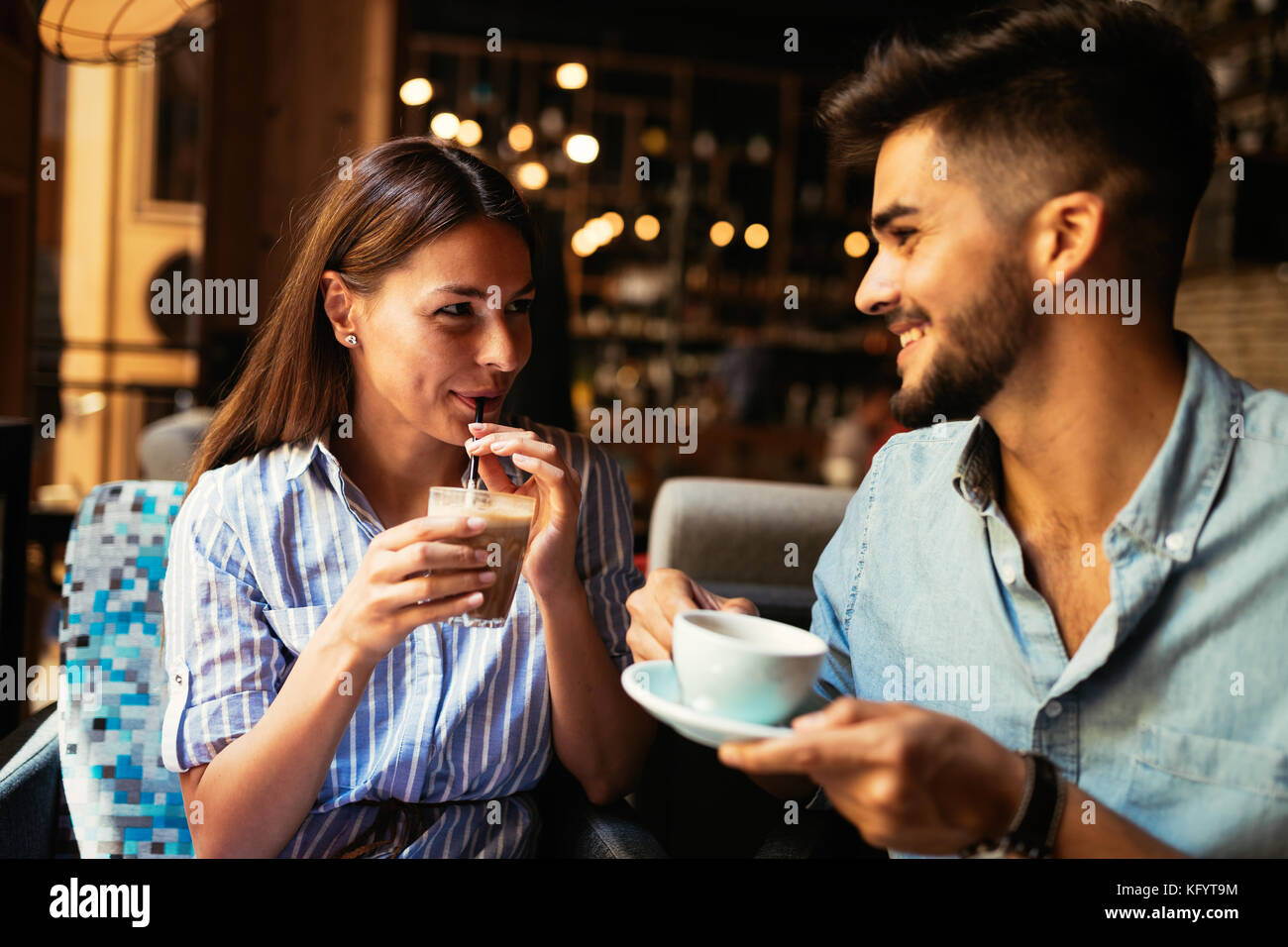 Young attractive couple on date in coffee shop Stock Photo Alamy