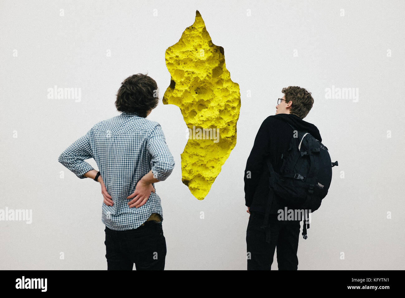 Istanbul, Turkey - January 21, 2014. Two visitors are looking at Anish Kapoor's work Yellow at the Sakip Sabanci Museum in Istanbul. Stock Photo