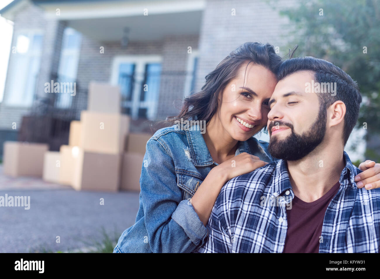 couple in front of new house Stock Photo - Alamy