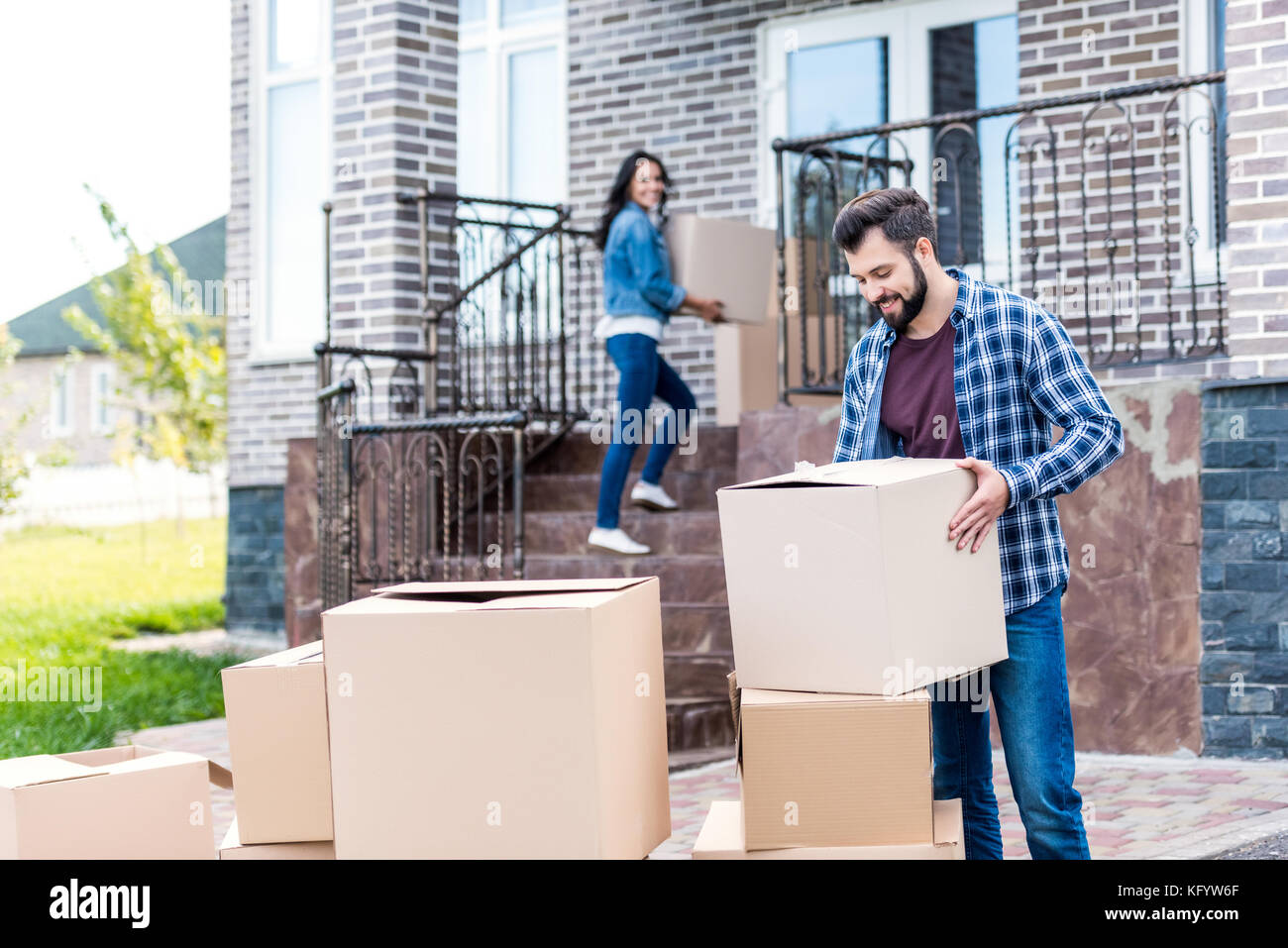 couple moving into new house Stock Photo - Alamy