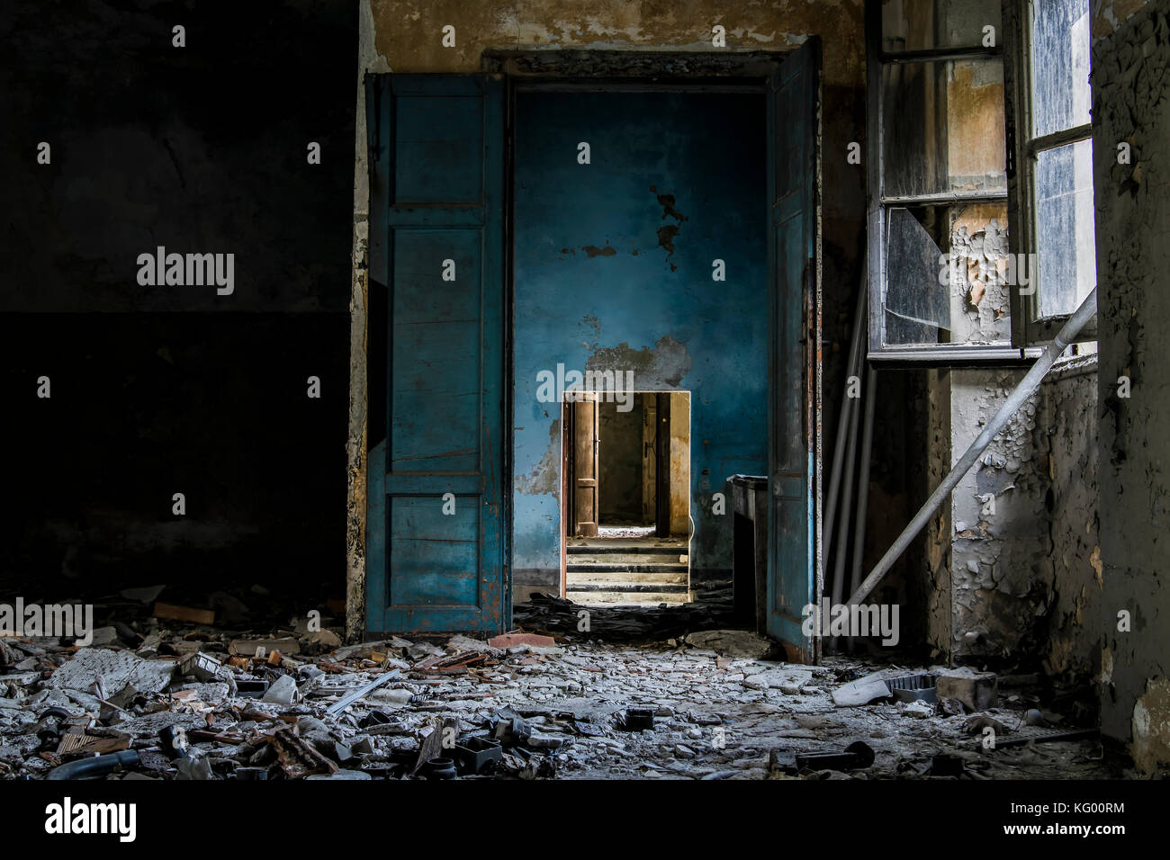 a view on a creepy corridon inside a psychiatric hospital abandoned some years ago Stock Photo