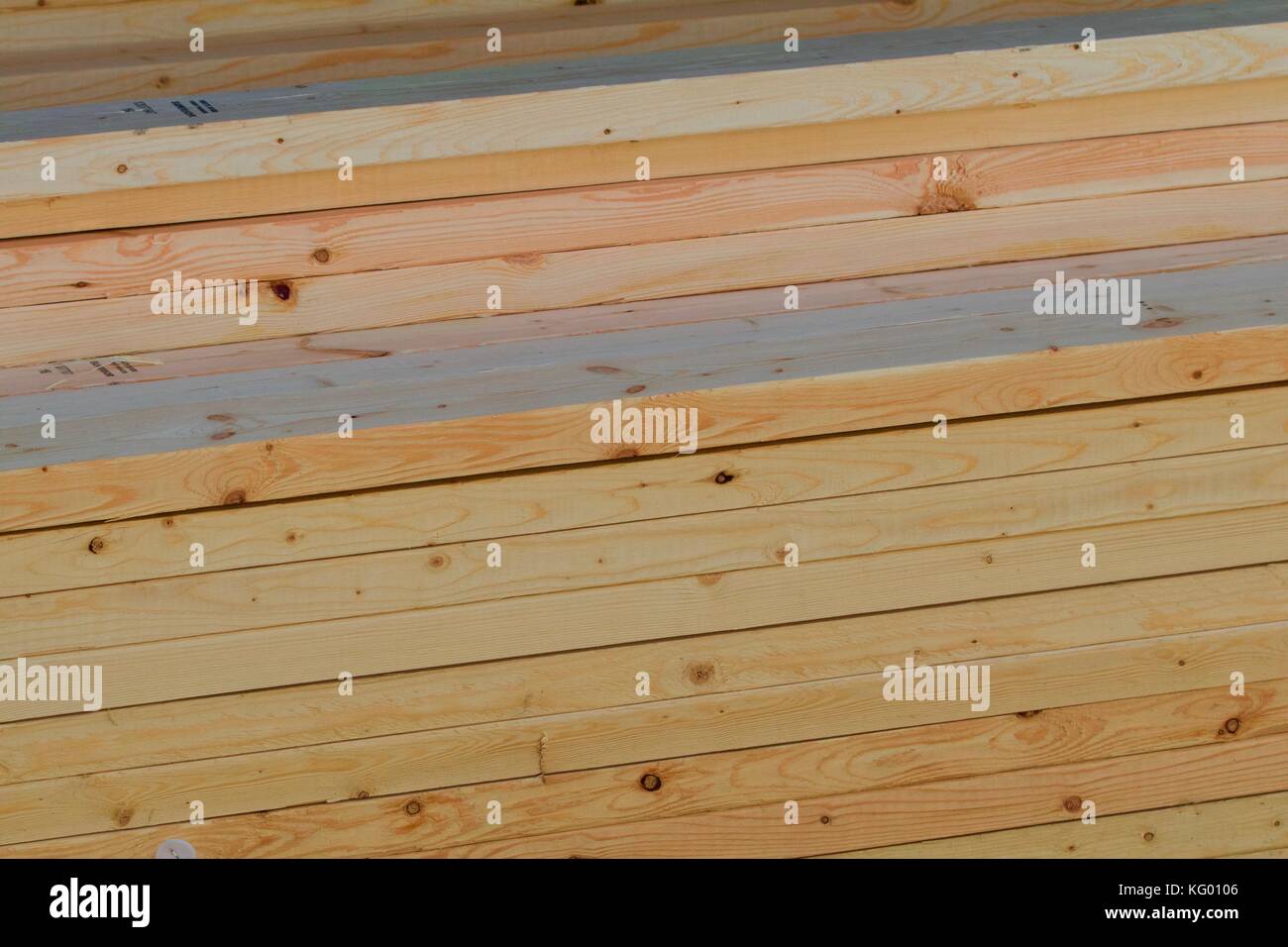 Side view of stacked planks Stock Photo