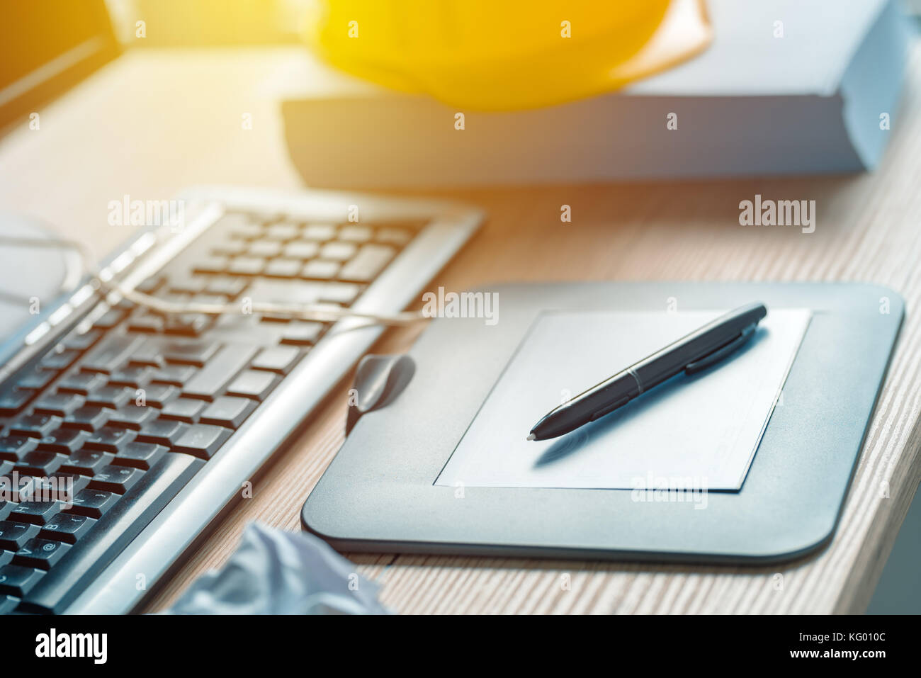 Graphic tablet and pencil on office desk in architecture and interior design project studio Stock Photo
