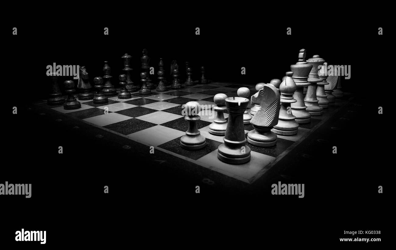 Chess pieces in starting position on a wooden Board Stock Photo by  ©Rostislavv 141335034