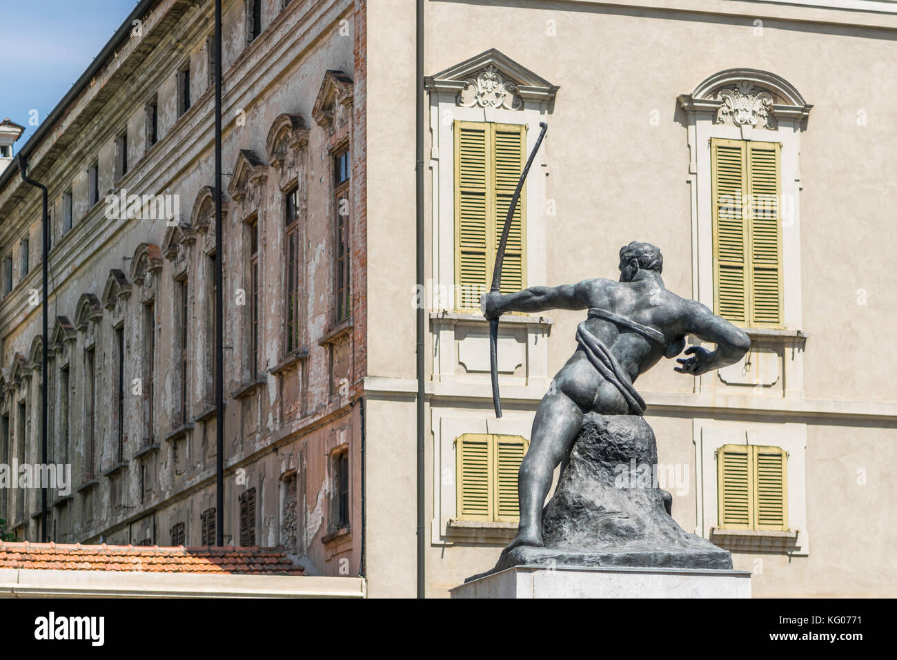 Windows on Piazza Trento e Trieste with statue, Crema Italy Stock Photo