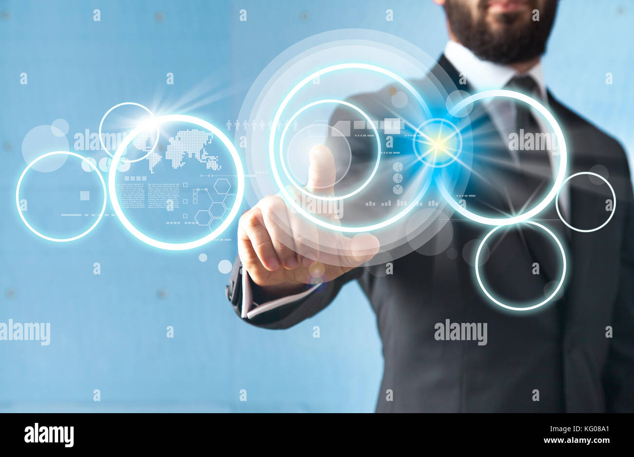 Businessman standing and working wth touch screen technology Stock ...