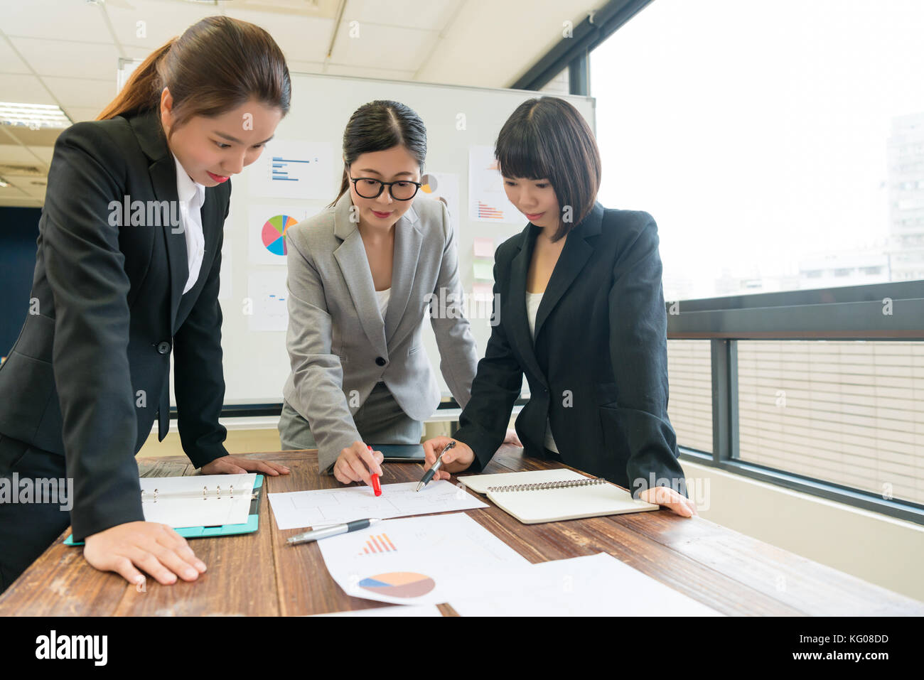 Manager explaining employees new hi-res stock photography and images ...