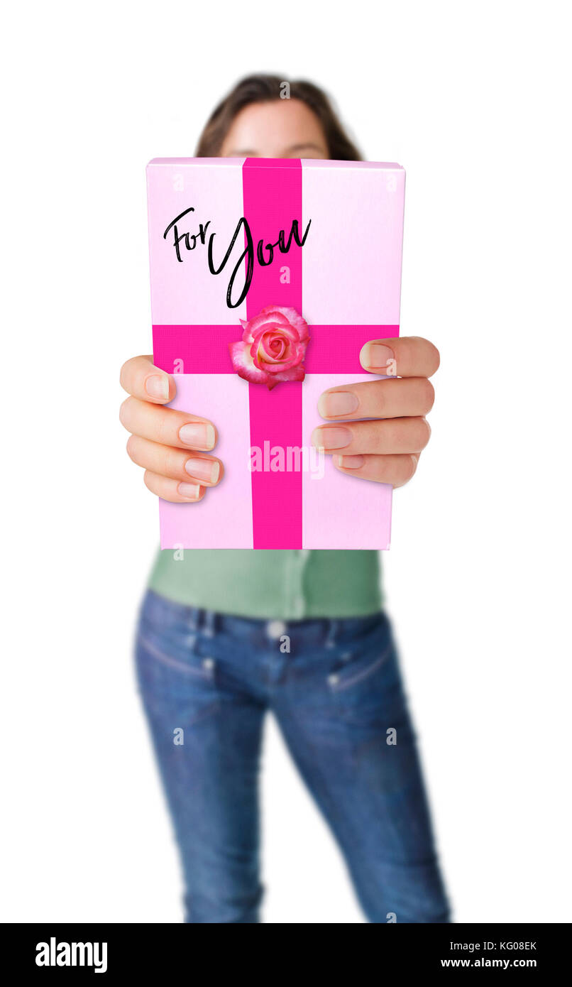 Woman holding a gift box isolated on white Stock Photo