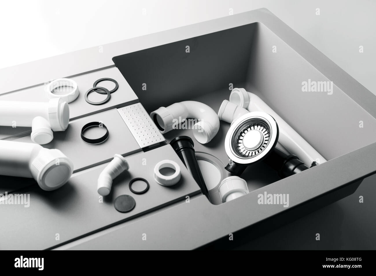 new kitchen sink with plumbing fittings Stock Photo