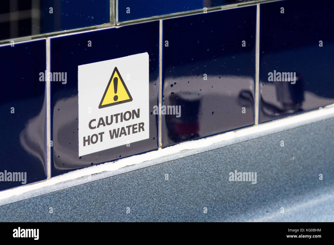 caution hot water sign Stock Photo