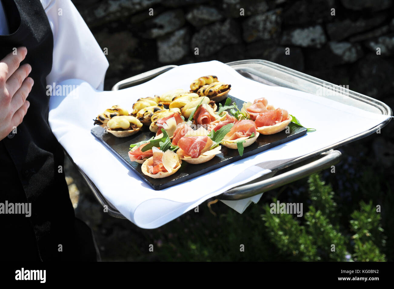 Waiter serving food hotel hi-res stock photography and images - Alamy