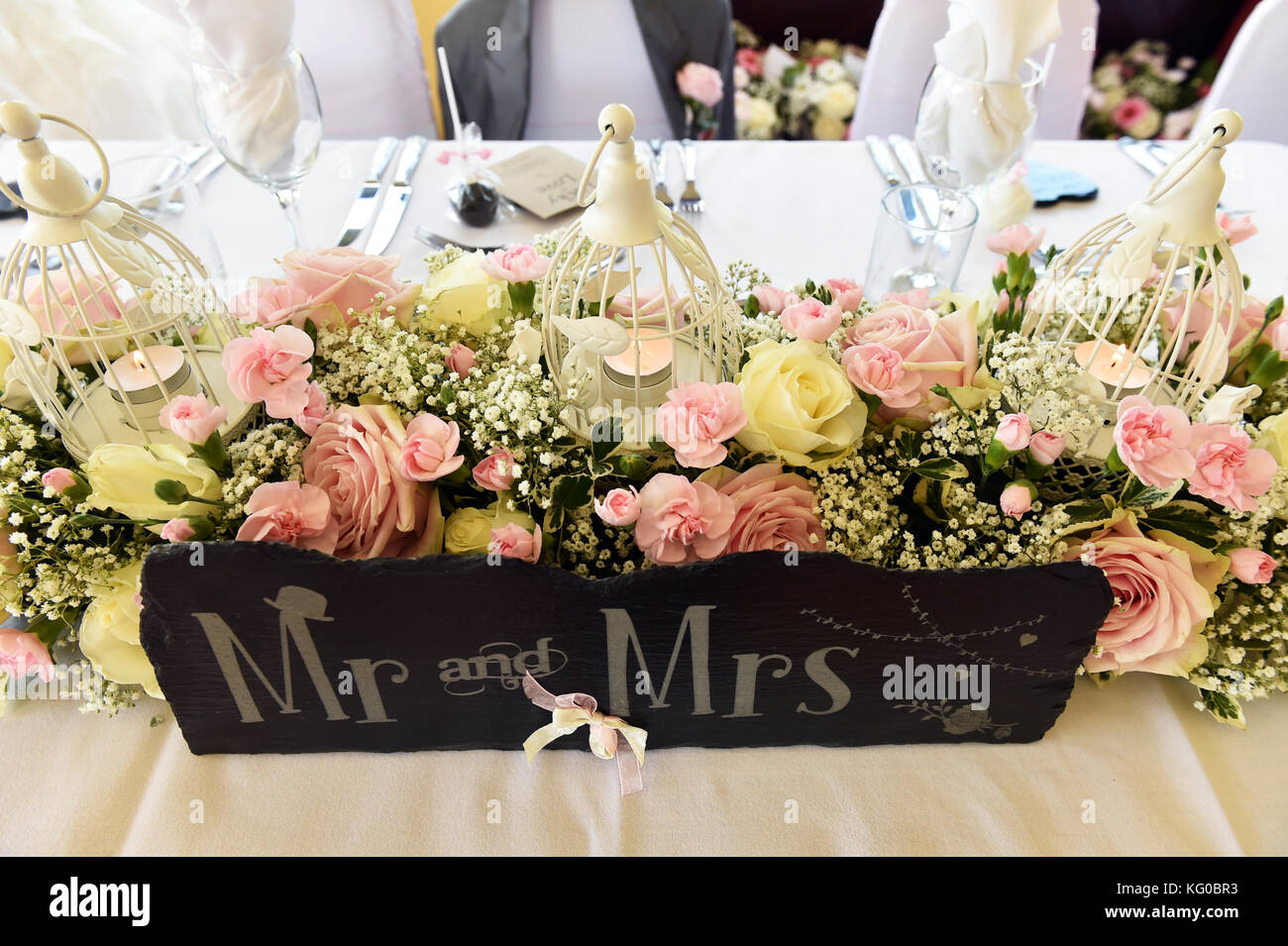 Floral display on the top table at a wedding Stock Photo
