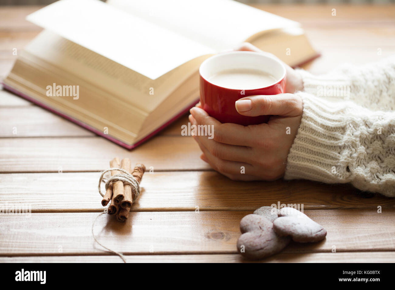 Hands holding hot cup of coffee Stock Photo - Alamy
