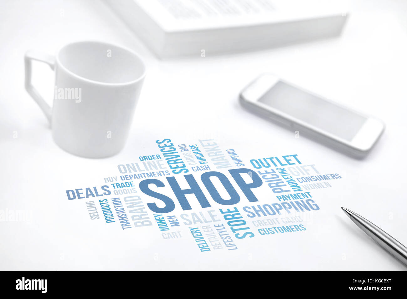 Shop concept word cloud print document, smartphone, book, pen and coffee cup. Blue toned Stock Photo