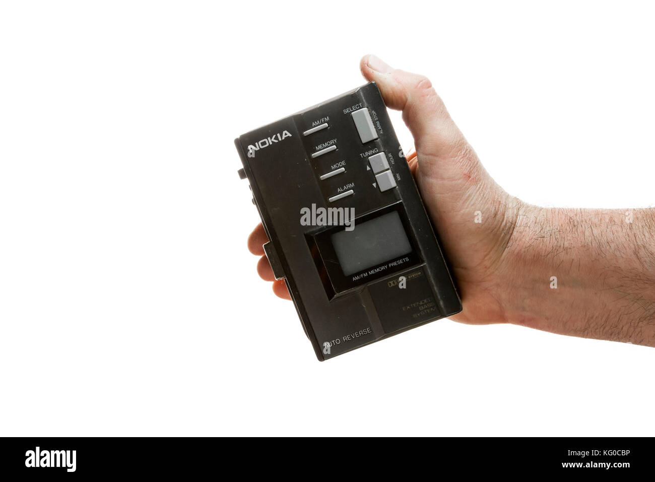retro Walkman type casette player held in hand Stock Photo