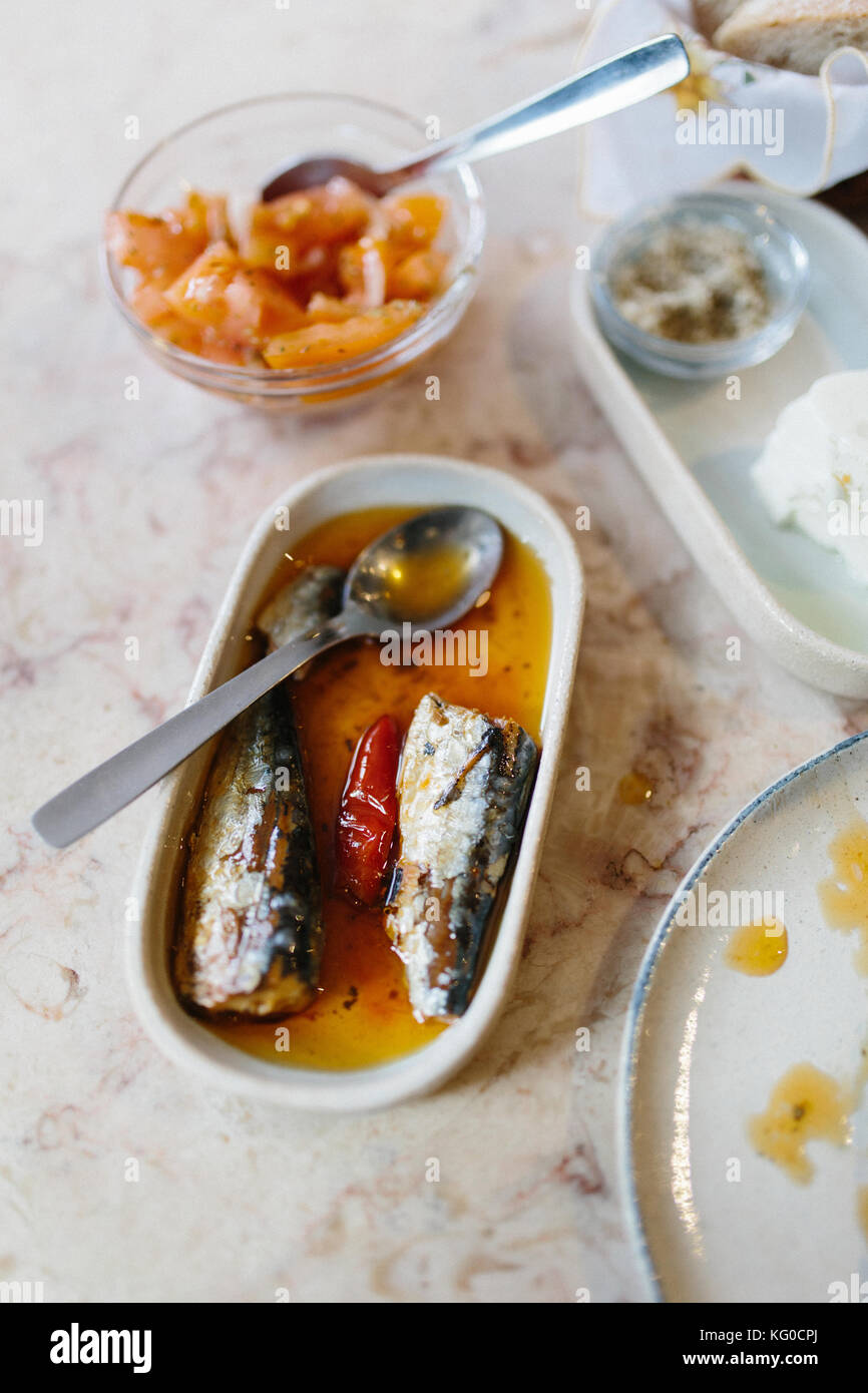 Sardines in chili oil, tomato and cheese for lunch in Lisbon, Portugal