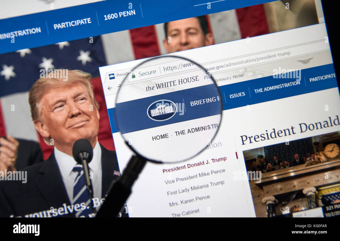 MONTREAL, CANADA - OCTOBER 2, 2017: Trump Administration web site under magnifying glass. Donald J. Trump is the 45th President of the United States. Stock Photo