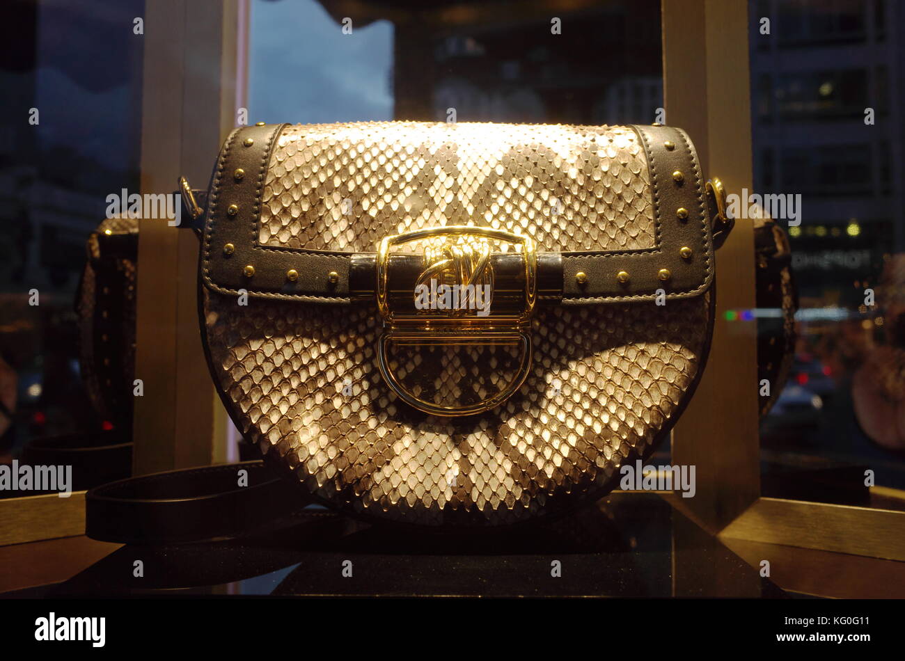 designer handbag on display in Harrods window, Knightsbridge, London