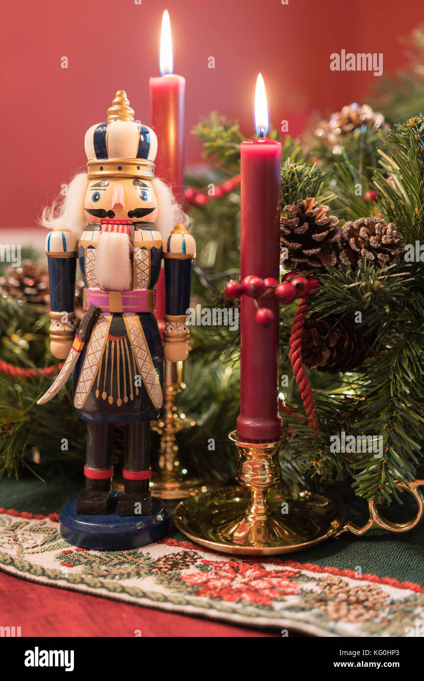 Christmas Display With Brass Candlesticks And A Nutcracker Stock