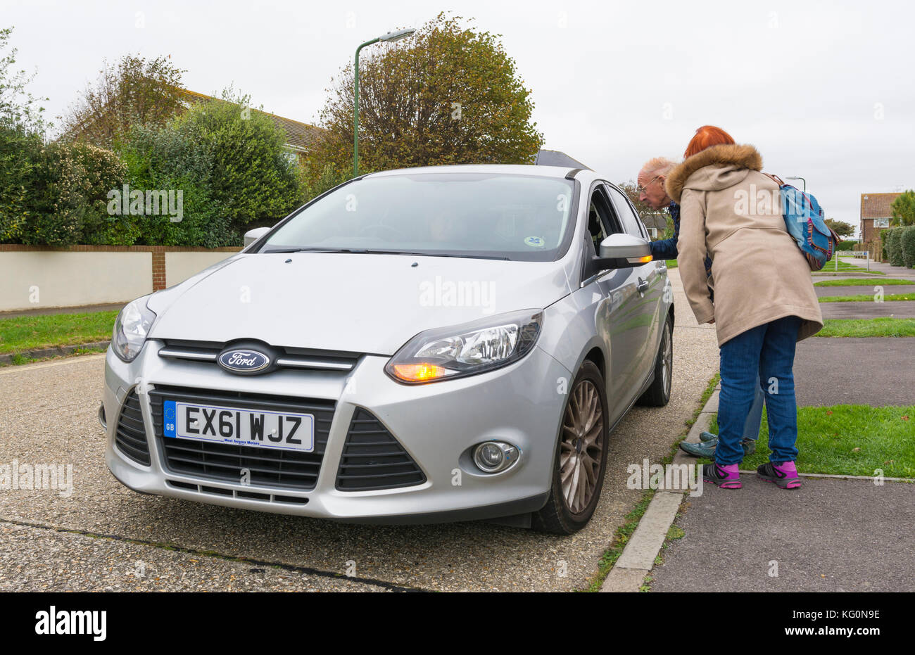 Car driver stopping to ask for directions in the UK Stock Photo Alamy
