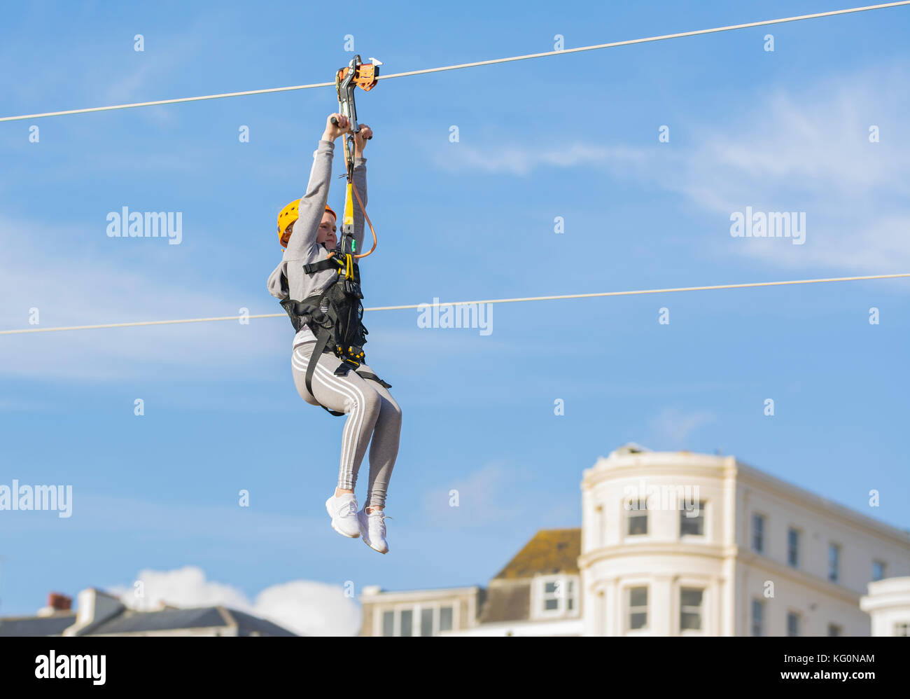 Brighton Zip Wire. A child riding on the Brighton Zip Line on the seafront in Brighton, East Sussex, England, UK. Stock Photo