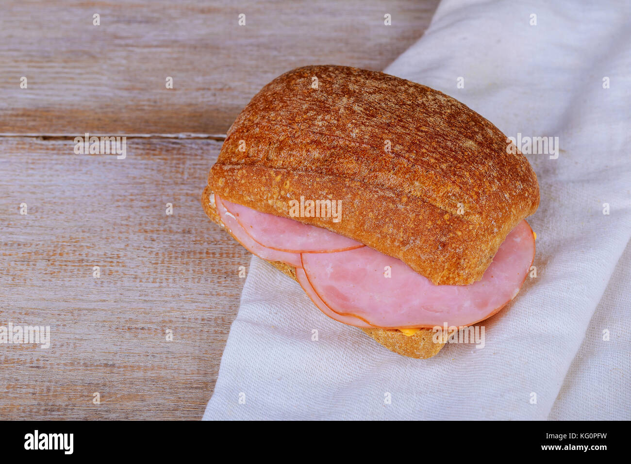 fresh sandwich on a white with texture ham sandwich on the table Stock Photo