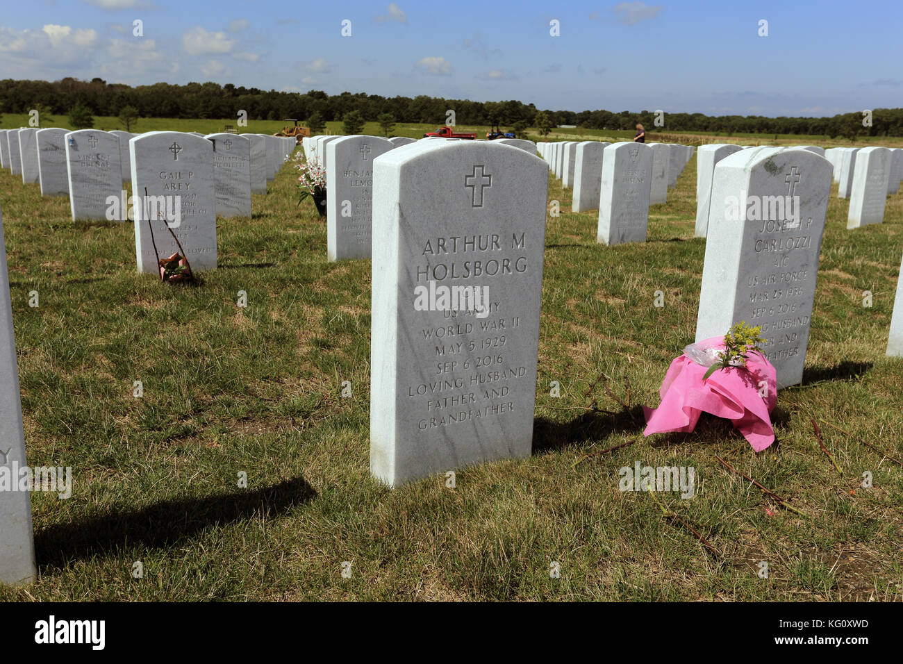 Flowers Grave Gravesite Cemetery Stock Photos & Flowers Grave Gravesite