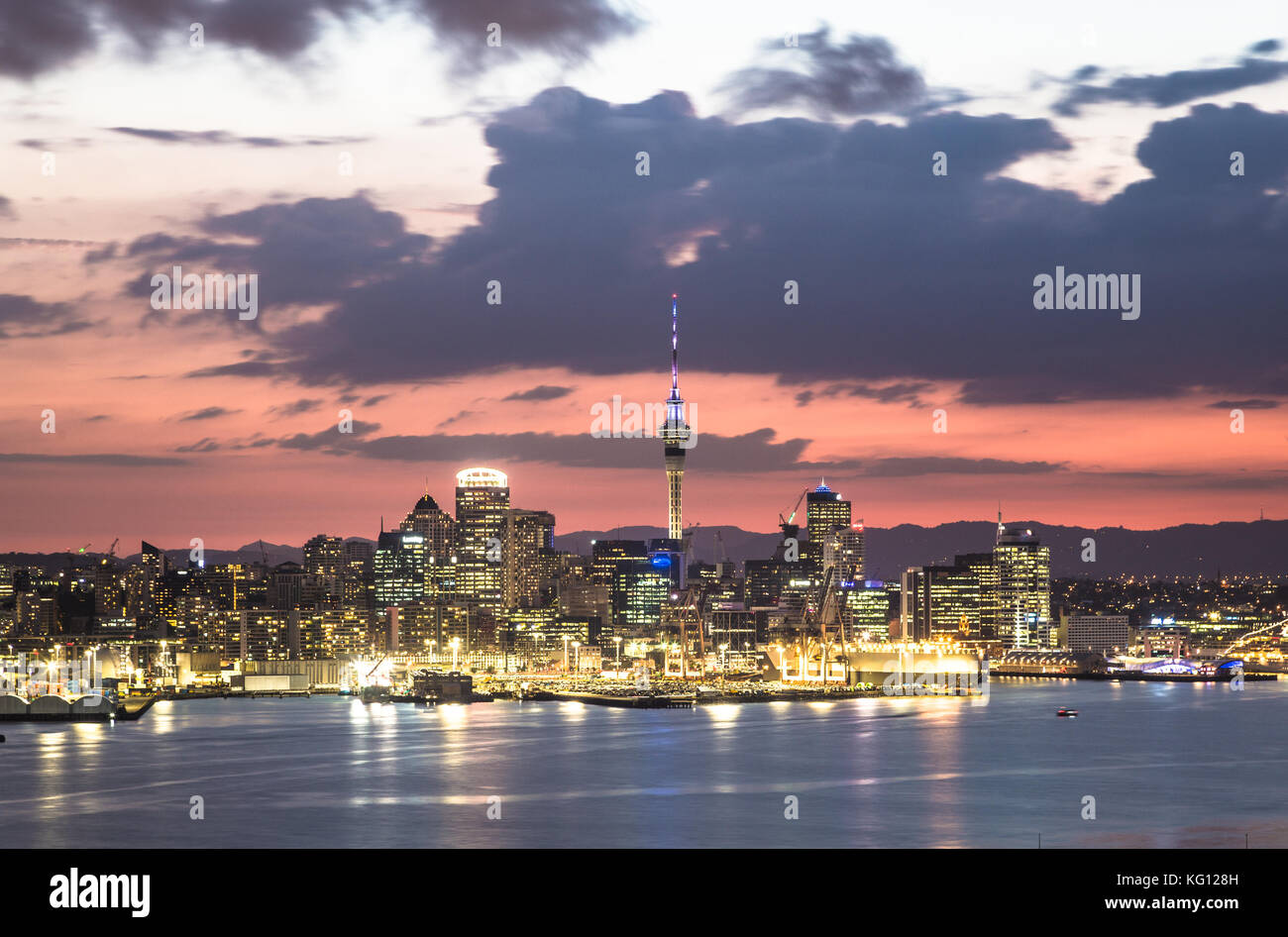 Stunning sunset over the Auckland financial district famous skyline from the viewpoint in Davenport in New Zealand Stock Photo