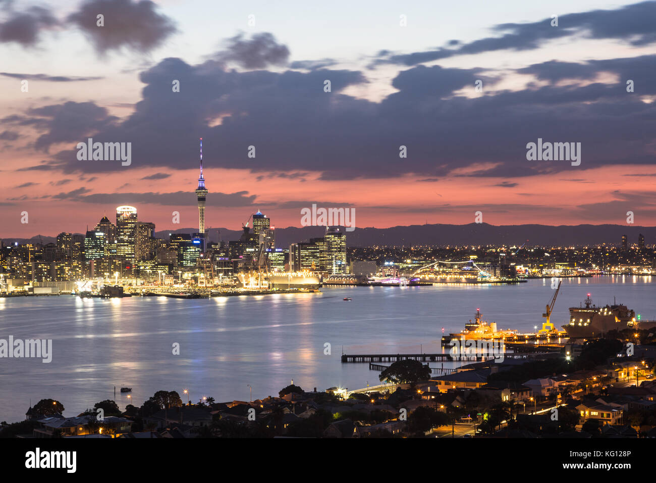 Stunning sunset over the Auckland financial district famous skyline from the viewpoint in Davenport in New Zealand Stock Photo