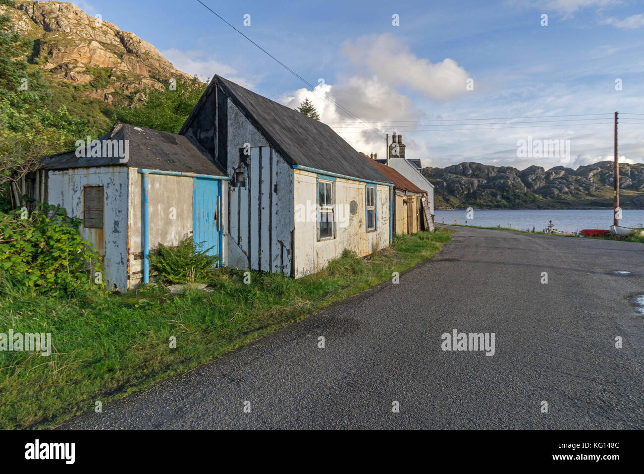 Towards the end of the road at Lower Diabaig, Wester Ross, Scotland, with a bluepainted house