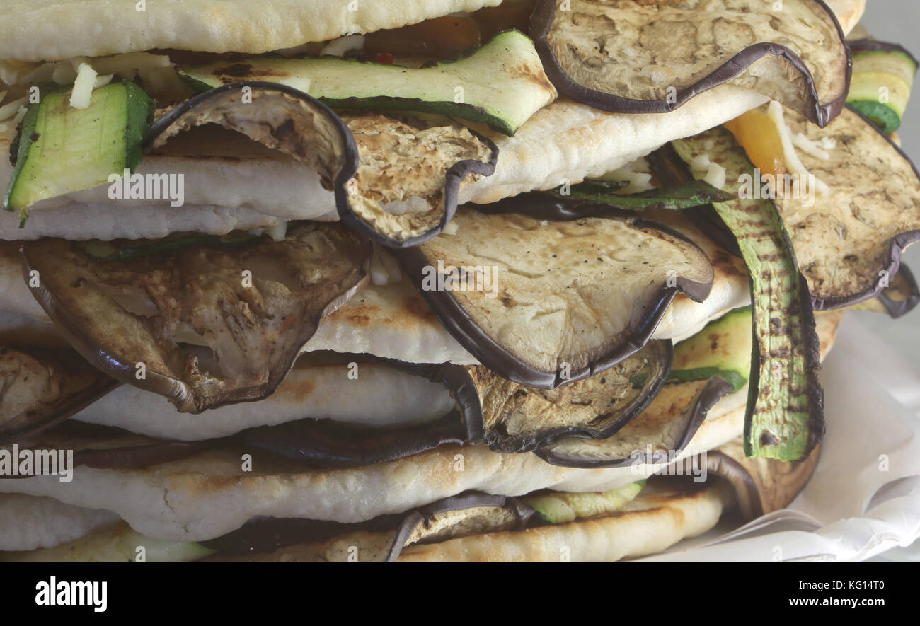 flatbread with grilled eggplant and zucchini for sale in italy Stock Photo