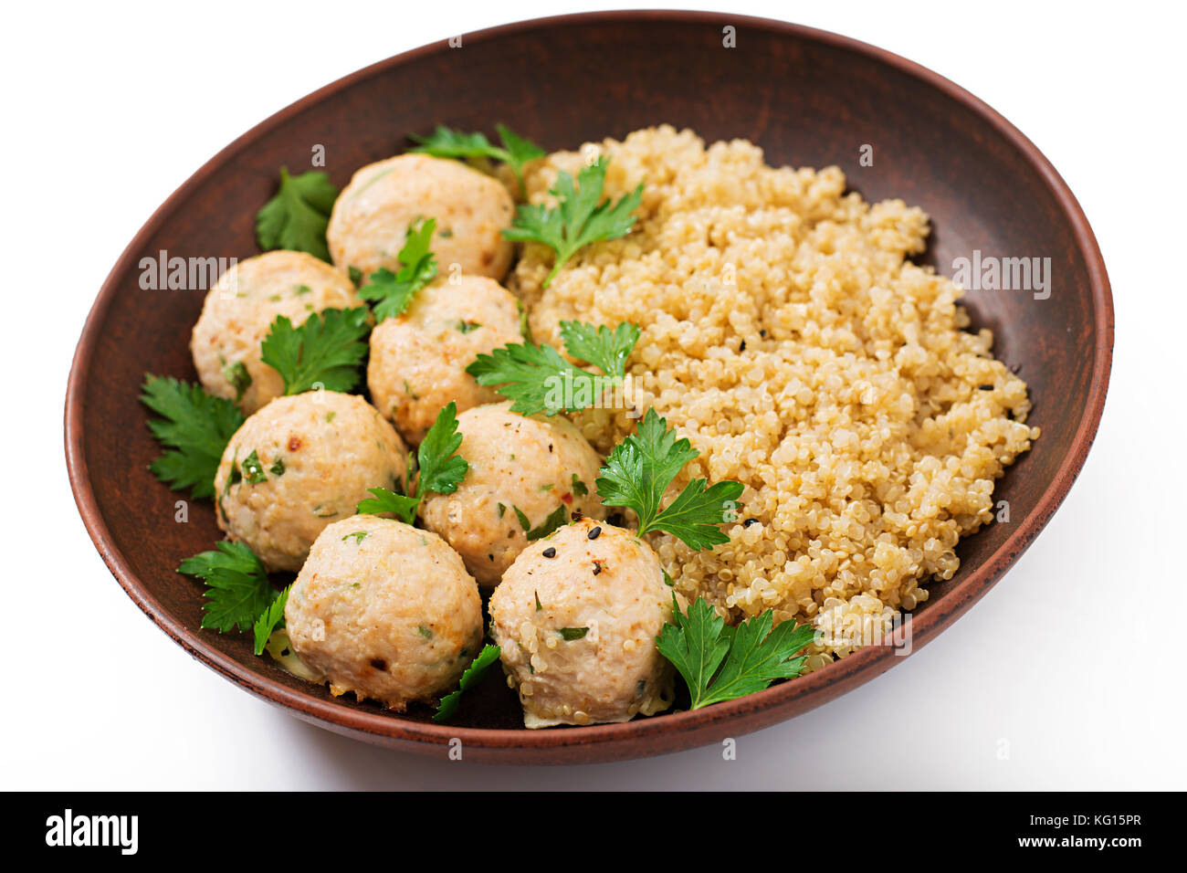Baked meatballs of chicken fillet with garnished with quinoa. Flat lay. Top view. Proper nutrition. Sports nutrition. Dietary menu Stock Photo
