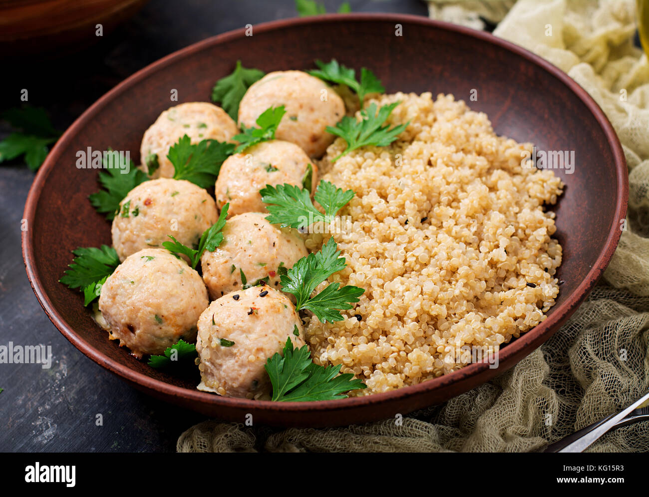 Baked meatballs of chicken fillet with garnished with quinoa. Flat lay. Top view. Proper nutrition. Sports nutrition. Dietary menu Stock Photo