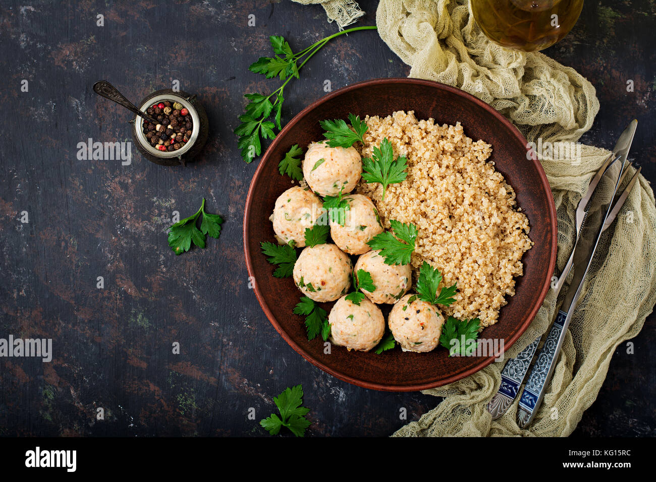 Baked meatballs of chicken fillet with garnished with quinoa. Flat lay. Top view. Proper nutrition. Sports nutrition. Dietary menu Stock Photo