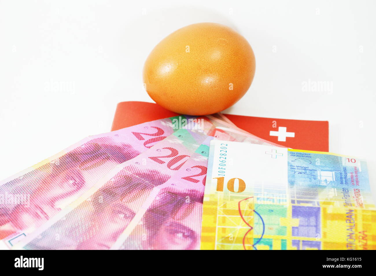 egg and Switzerland  banknote Stock Photo