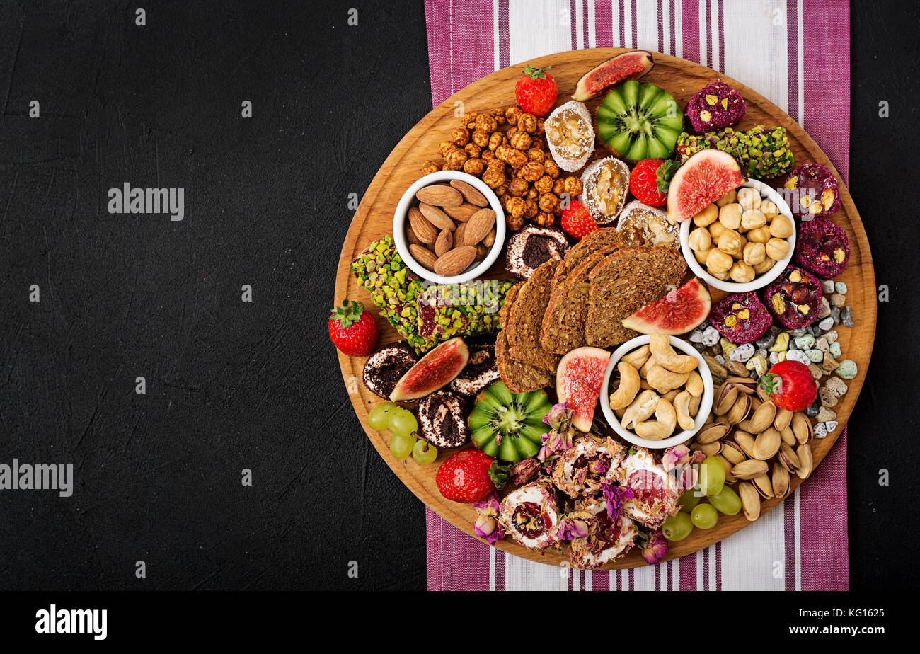 Mix fruits and nuts, healthy diet, Turkish sweets, eating lean. Flat